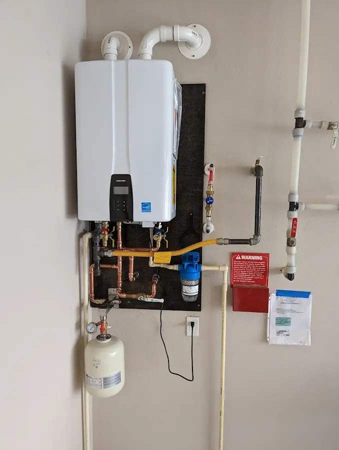 Professional plumber installing copper piping in a Glenarden home